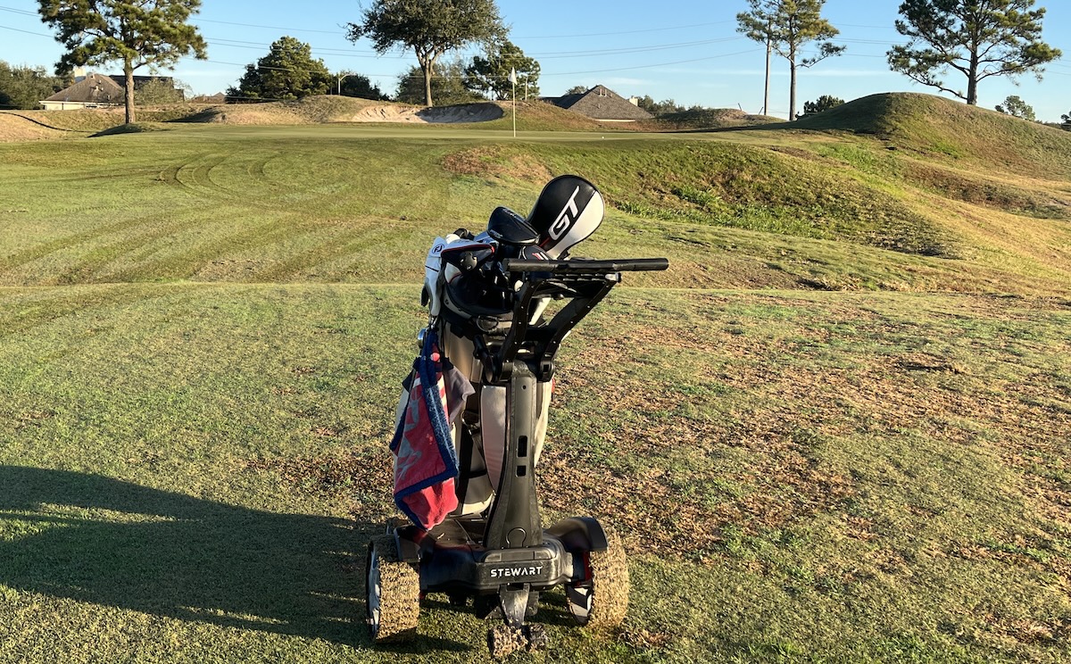 Stewart Golf Q Follow heading to first green