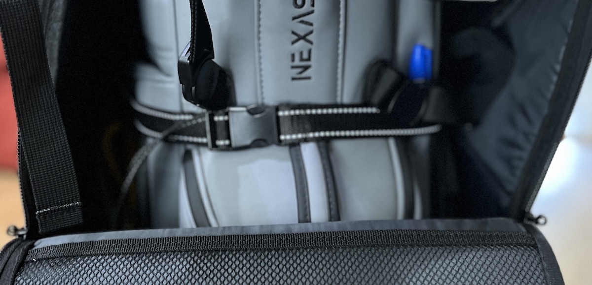Internal strap securing a golf bag inside the Bag Boy Freestyle travel cover