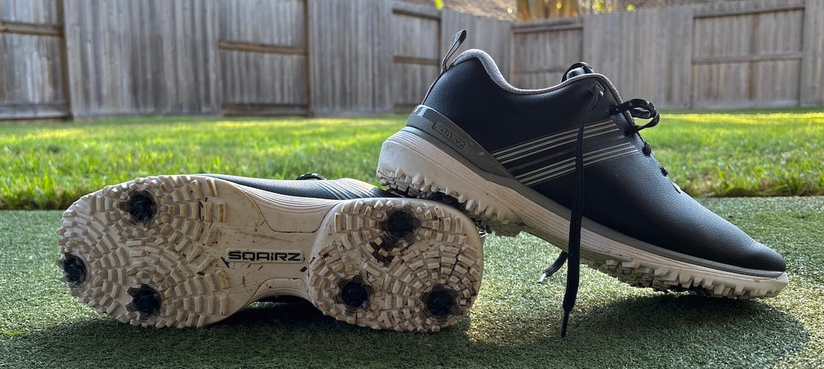 SQAIRZ ProS2 LT golf shoes with dirty soles showing the spikes
